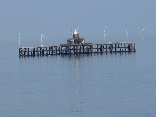 Hern Bay palisade alone at sea.