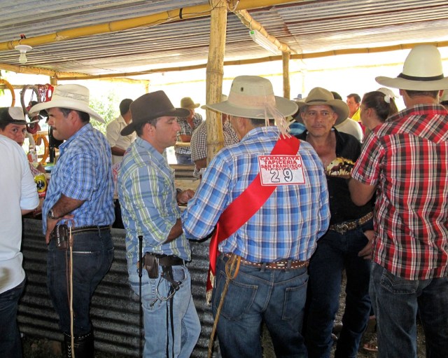 Cabalgata Cowboys mosey up to the bar