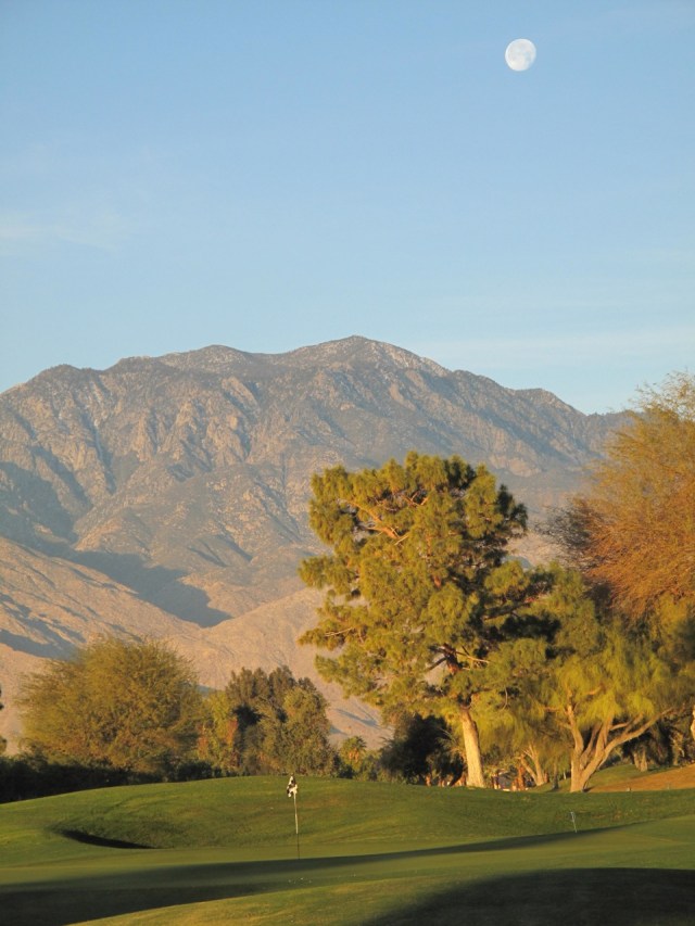 Moon over golf course